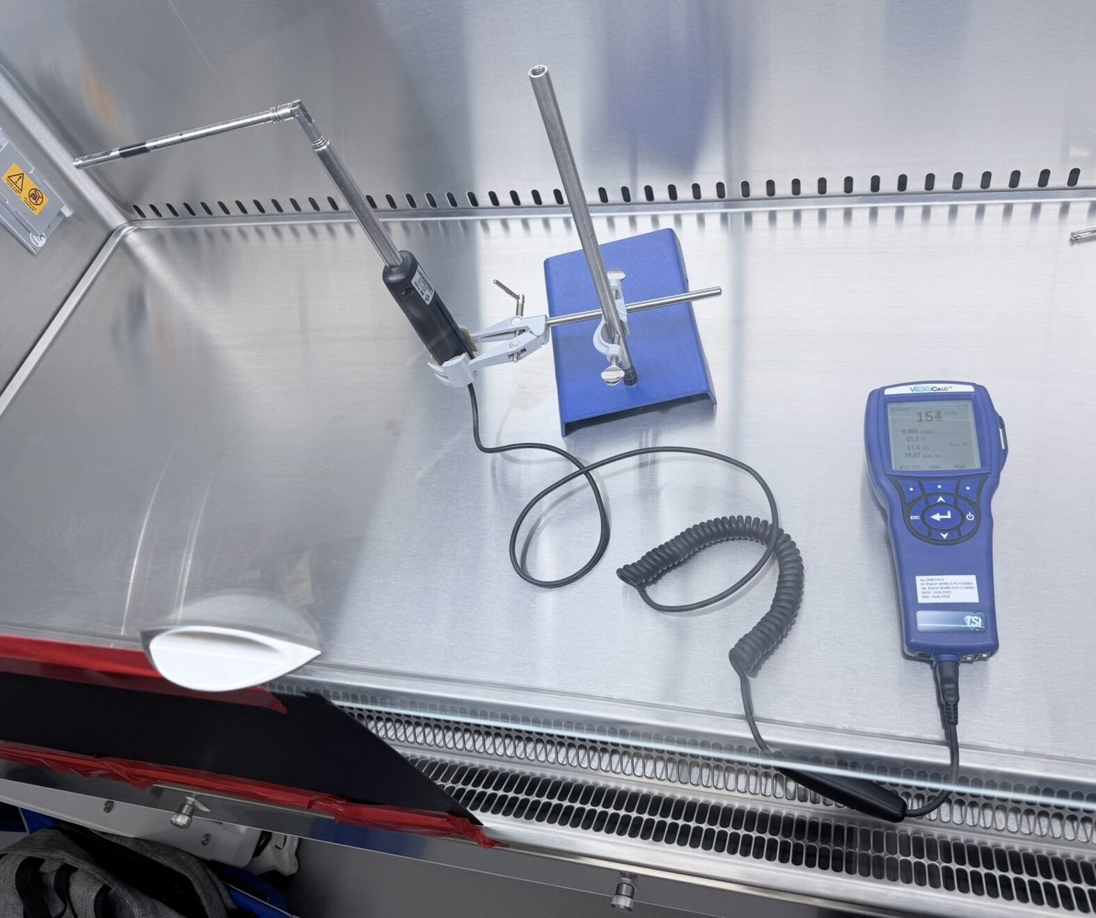 LabCertTech NSF 49 certified technician performing biological safety cabinet downflow and inflow velocity testing in Houston Texas